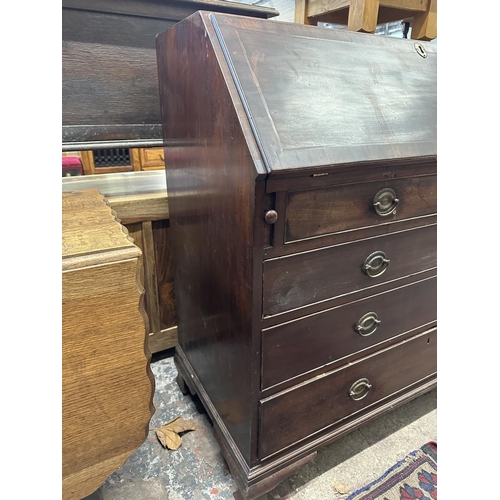 55 - A George III inlaid mahogany bureau - approx. 110cm high x 114cm wide x 53cm deep