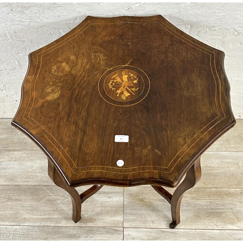 61 - A late 19th/early 20th century inlaid rosewood serpentine octagonal two tier side table - approx. 74... 