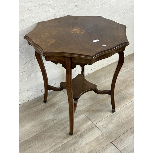 61 - A late 19th/early 20th century inlaid rosewood serpentine octagonal two tier side table - approx. 74... 