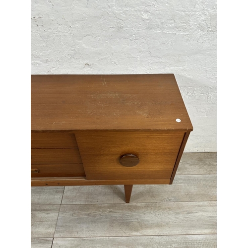 69 - A mid 20th century teak sideboard - approx. 72cm high x 154cm wide x 40cm deep