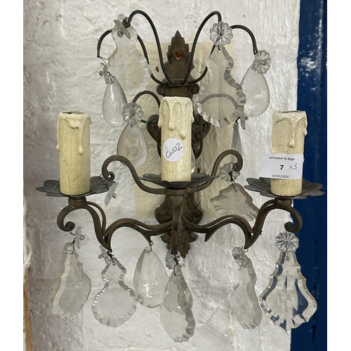 7 - Three Rococo style gilt metal wall sconces with crystal droplets