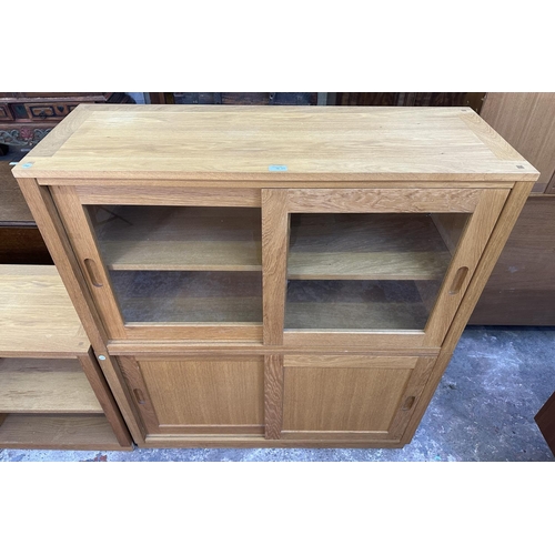 70 - A Laura Ashley Milton oak three compartment storage system