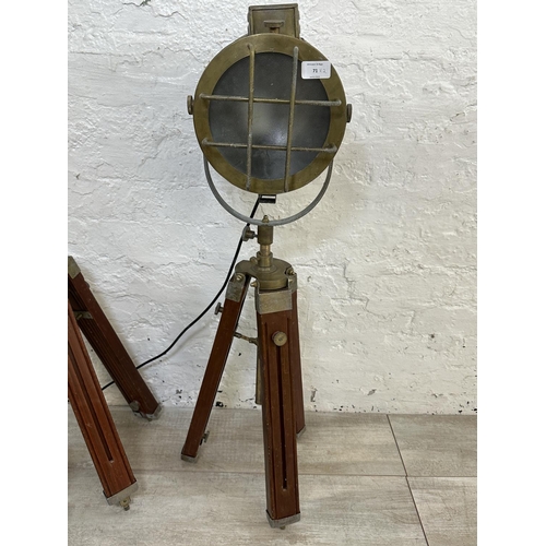 71 - A pair of industrial style wood and brass effect spotlight tripod floor lamps - approx. 90cm high