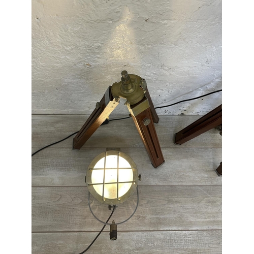 71 - A pair of industrial style wood and brass effect spotlight tripod floor lamps - approx. 90cm high