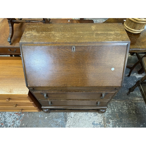 72 - Three pieces of furniture, one Edwardian mahogany piano stool, one oak drop leaf tea trolley and one... 