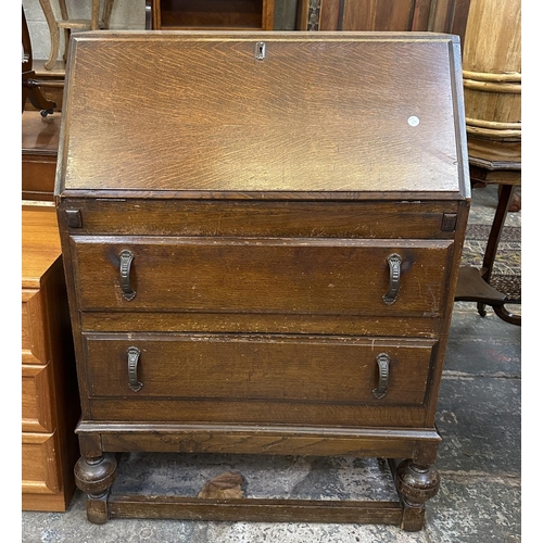 72 - Three pieces of furniture, one Edwardian mahogany piano stool, one oak drop leaf tea trolley and one... 