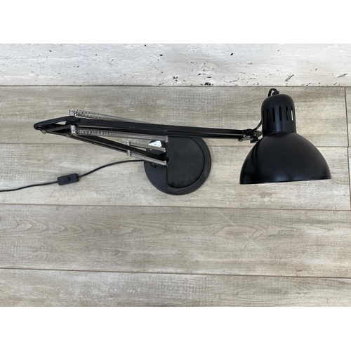 74 - An Anglepoise style black metal desk lamp