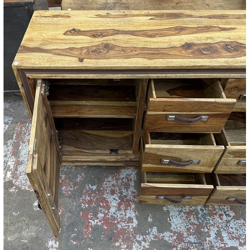 78 - An Indian sheesham wood sideboard - approx. 82cm high x 175cm wide x 45cm deep