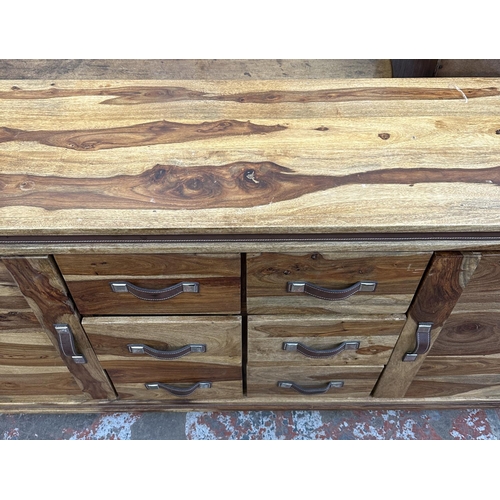 78 - An Indian sheesham wood sideboard - approx. 82cm high x 175cm wide x 45cm deep