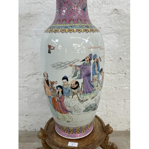 8 - A Chinese Famille Rose hand painted porcelain vase on carved hardwood stand - vase approx. 63cm high... 