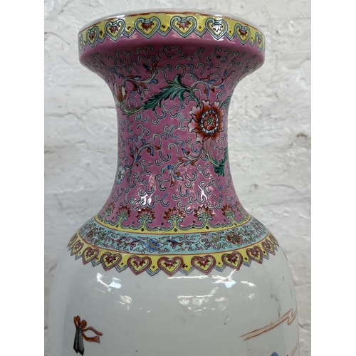 8 - A Chinese Famille Rose hand painted porcelain vase on carved hardwood stand - vase approx. 63cm high... 