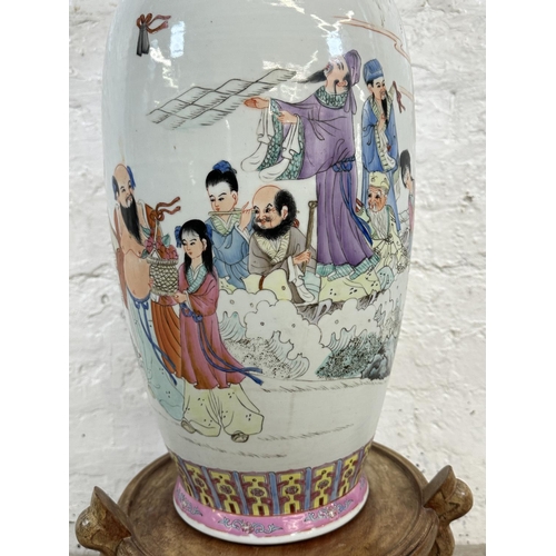 8 - A Chinese Famille Rose hand painted porcelain vase on carved hardwood stand - vase approx. 63cm high... 