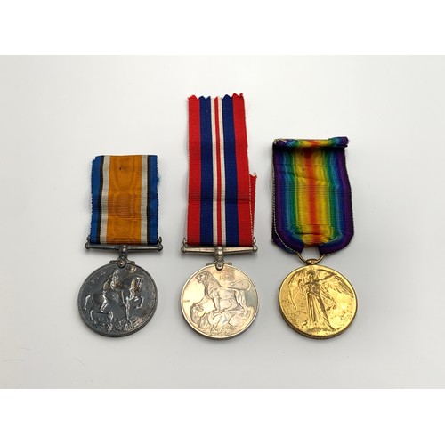 2373 - Three British military medals, one WWI pair presented to 48061 Pte. L. Sutclife. S. LAN. R. and one ... 