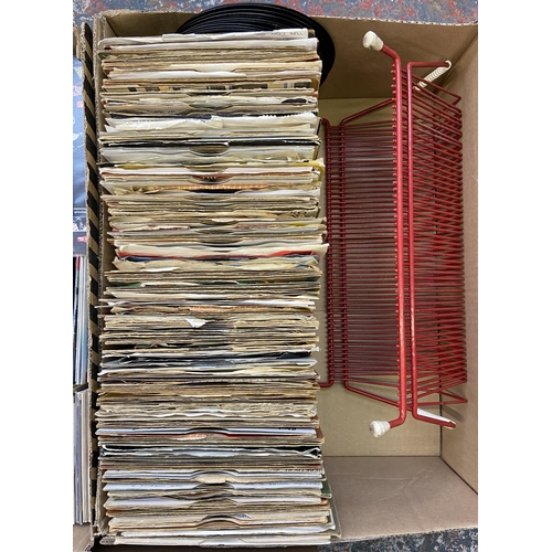 768 - Three boxes containing a 7 inch vinyl record display rack, approx. two hundred and thirty vinyl reco... 