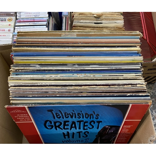 768 - Three boxes containing a 7 inch vinyl record display rack, approx. two hundred and thirty vinyl reco... 