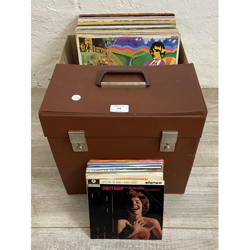 775 - One box and one storage case containing approx. one hundred vinyl records includes Faces 'Ooh La La'... 