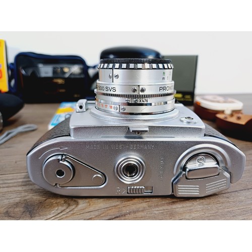 701 - Eight items to include cased Kyocera Yashica DF-10 compact 35mm camera, cased Samsung Digimax Cyber ... 