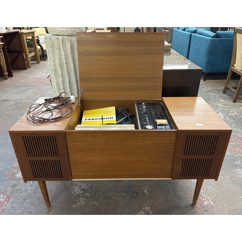 754 - A Ferguson 3334 solid state radiogram comprising four-speed autochanger turntable and three-band rec... 