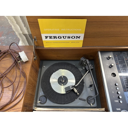 754 - A Ferguson 3334 solid state radiogram comprising four-speed autochanger turntable and three-band rec... 