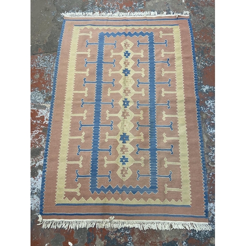 188A - A mid 20th century Kilim rug - approx. 188cm x 128cm