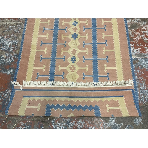 188A - A mid 20th century Kilim rug - approx. 188cm x 128cm