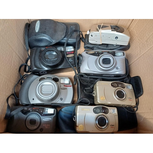 708 - Two boxes, one containing a collection of Samsung compact cameras and one containing a collection of... 