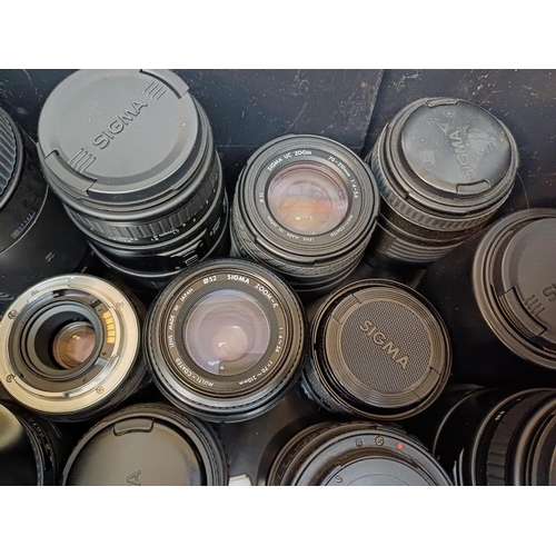 714 - A collection of Sigma camera lenses