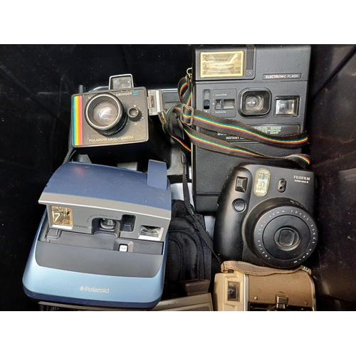 718 - A collection of instant cameras to include Fujifilm Instax Mini 8, Polaroid ONE600, Polaroid 80B lan... 