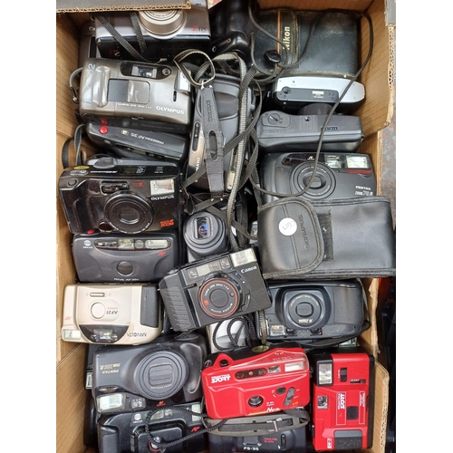 722 - Two boxes containing a large collection of cameras for spares or repair to include Pentax, Minolta, ... 