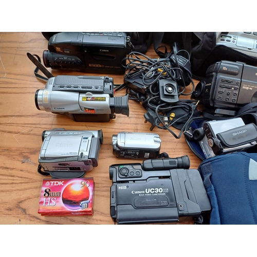 725 - A large collection of camcorders to include Canon, Panasonic, JVC, Sony etc.