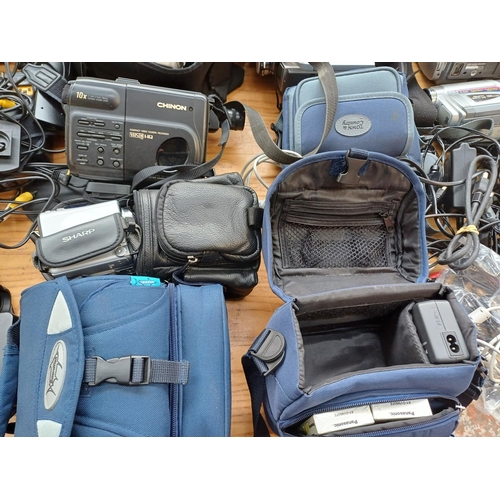 725 - A large collection of camcorders to include Canon, Panasonic, JVC, Sony etc.