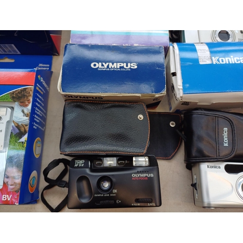 728 - A collection of boxed cameras to include Olympus AZ-3000 Superzoom, Konica Z-UP80E, Olympus Trip AFS... 