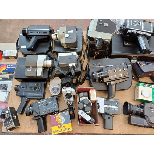 729 - A collection of cine cameras to include Bauer, Yashica, Sekonic, Bell & Howell etc.