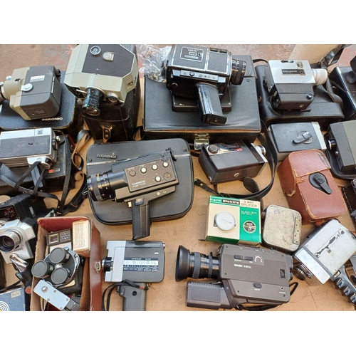 729 - A collection of cine cameras to include Bauer, Yashica, Sekonic, Bell & Howell etc.