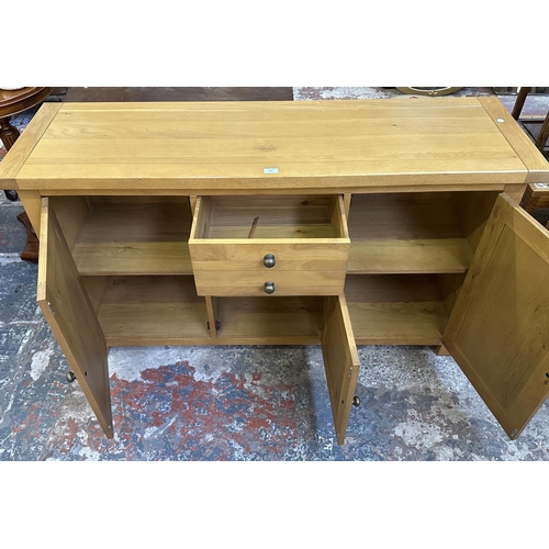 109 - A Morris Furniture Company oak sideboard - approx. 85cm high x 150cm wide x 45cm deep