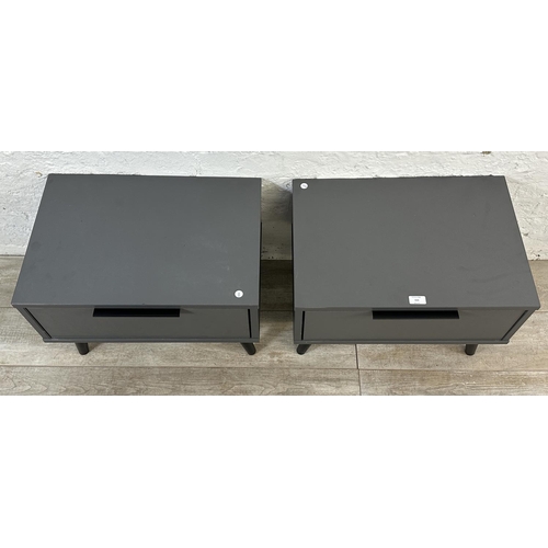 111 - A pair of modern grey laminate bedside cabinets - approx. 42cm high x 57cm wide x 39cm deep