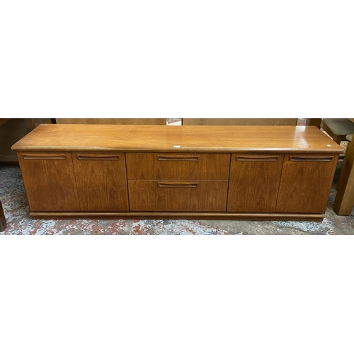 116 - A mid 20th century Meredew teak low sideboard - approx. 55cm high x 201cm wide x 45cm deep