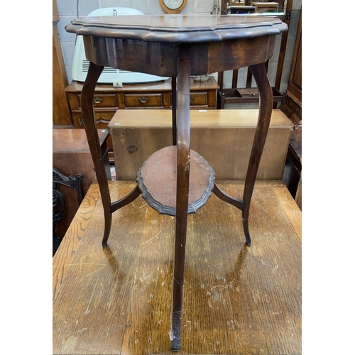 117 - An Edwardian walnut serpentine two tier side table - approx. 71cm high x 74cm wide x 50cm deep