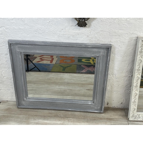 12 - Three modern framed wall mirrors - largest approx. 76cm high x 95cm wide