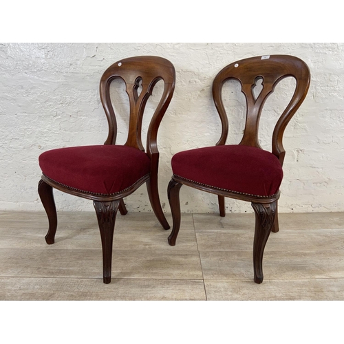 120 - A pair of Victorian mahogany and red fabric upholstered dining chairs