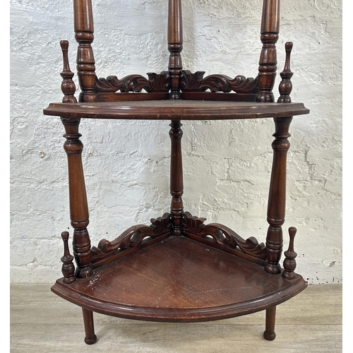 13 - A 19th century style mahogany four tier corner whatnot stand - approx. 146cm high x 58cm wide x 40cm... 