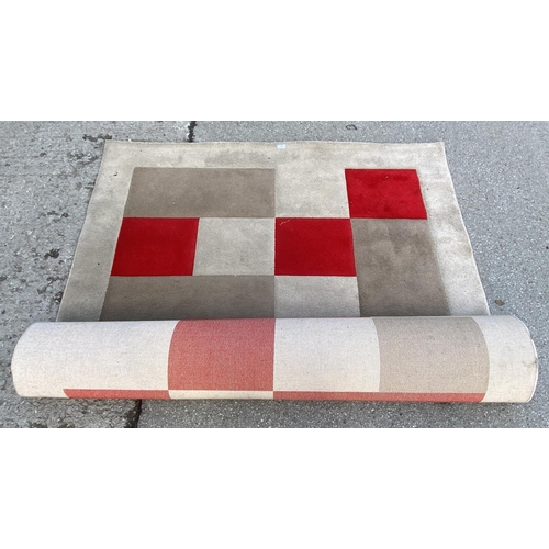 130 - A Brooklyn Diamond beige and red polypropylene rug  - approx. 220cm x 160cm