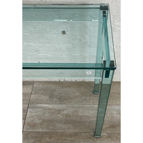 133 - A modern glass console table - approx. 75cm high x 121cm wide x 35cm deep