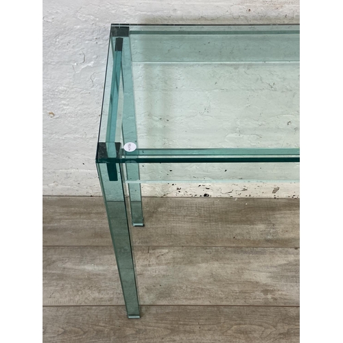 133 - A modern glass console table - approx. 75cm high x 121cm wide x 35cm deep