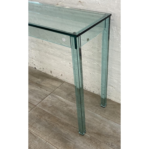 133 - A modern glass console table - approx. 75cm high x 121cm wide x 35cm deep