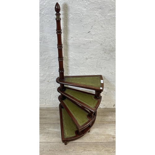 14 - A set of 19th century style mahogany and green leather spiral library steps - approx. 110cm high