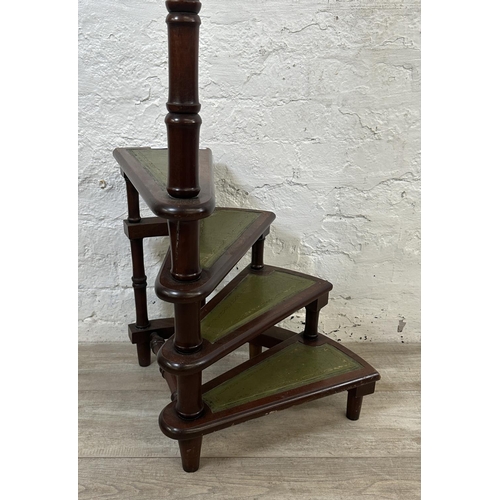 14 - A set of 19th century style mahogany and green leather spiral library steps - approx. 110cm high