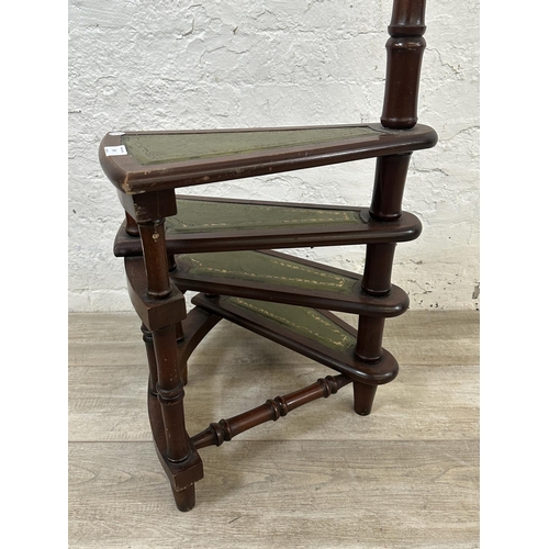 14 - A set of 19th century style mahogany and green leather spiral library steps - approx. 110cm high