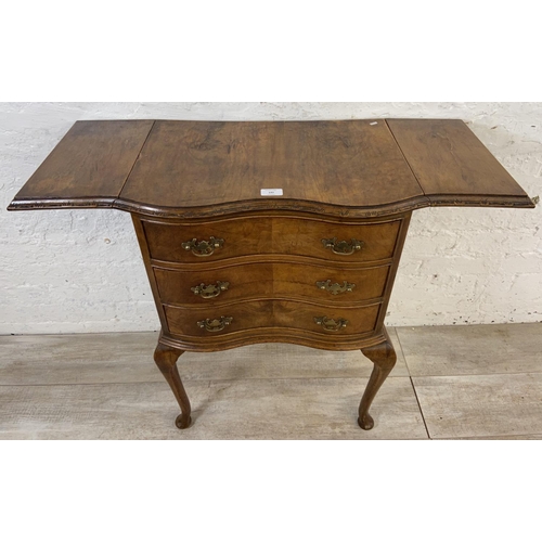 142 - A Queen Anne style walnut drop leaf chest of drawers - approx. 78cm high x 90cm wide x 36cm deep