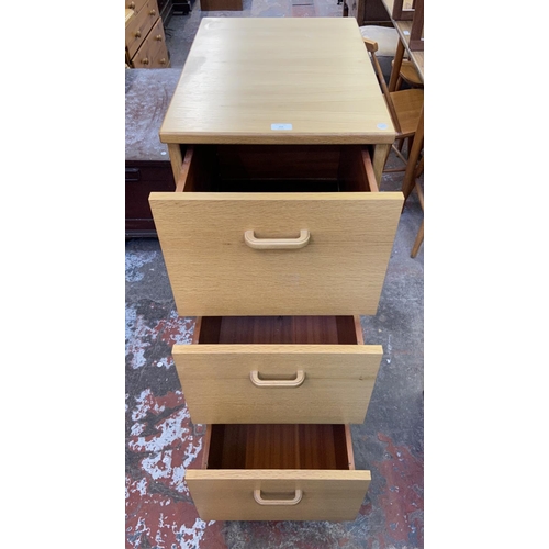 151 - An oak effect three drawer office filing cabinet - approx. 104cm high x 43cm wide x 65cm deep